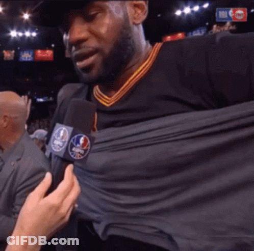Man Being Interviewed With NBA Logo Microphone GIF