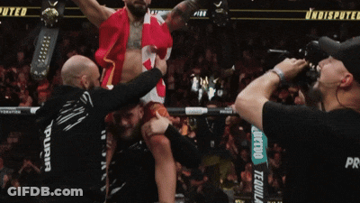 Man Being Lifted In Air With UFC GIF