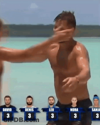 Man Being Punched In Face In Front Of Crowd GIF