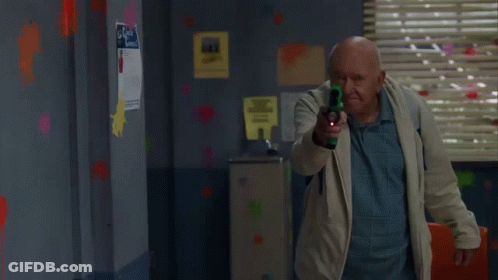 Man Beside Sports Sign GIF