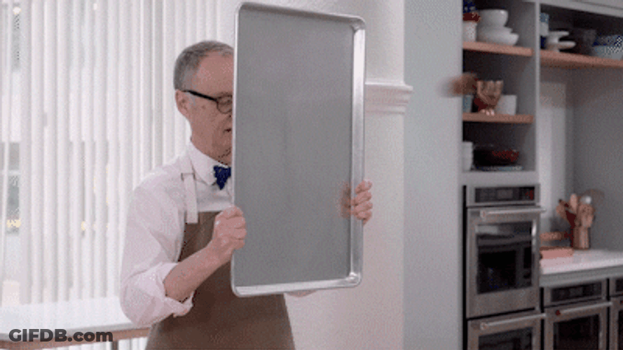 Man Blocking A Flying Meatball GIF