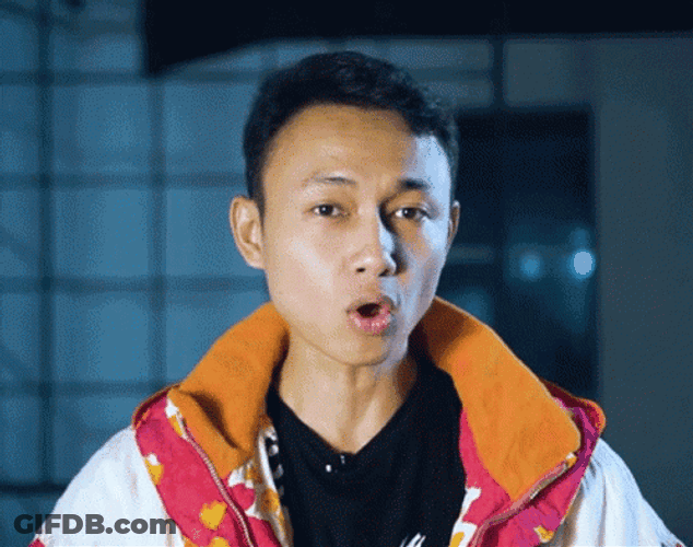 Man Blow Air In Front Of Camera GIF