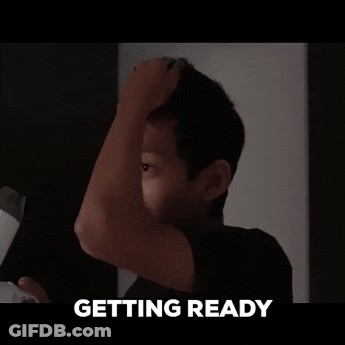 Man Blowing Dry His Hair Getting Ready GIF