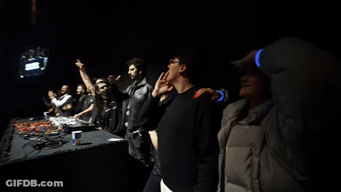 Man Blowing Kiss At Concert GIF