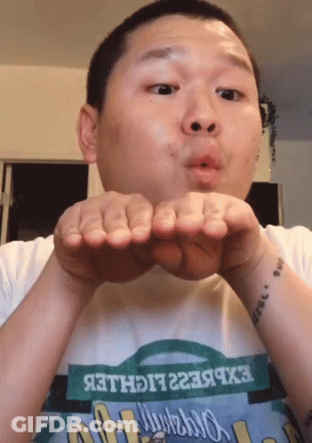 Man Blowing Kiss In Express Lighter T-Shirt GIF
