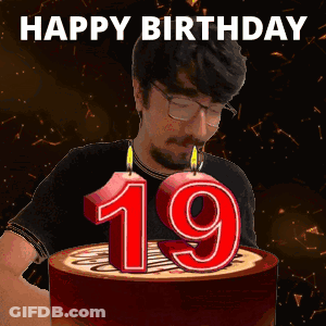 Man Blowing Out 19 Candles GIF
