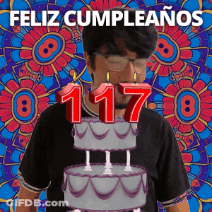 Man Blowing Out Candles On Birthday Cake With Number 117 GIF