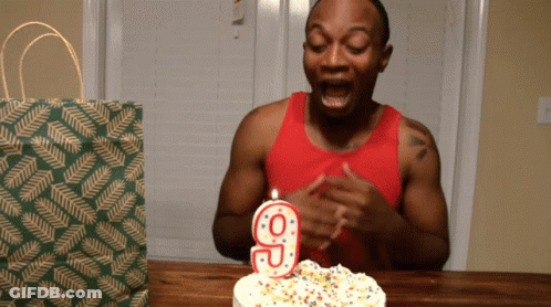 Man Blowing Out Number 9 Candle GIF