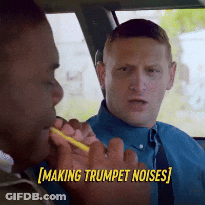 Man Blowing Trumpet Making Trumpet Noises GIF