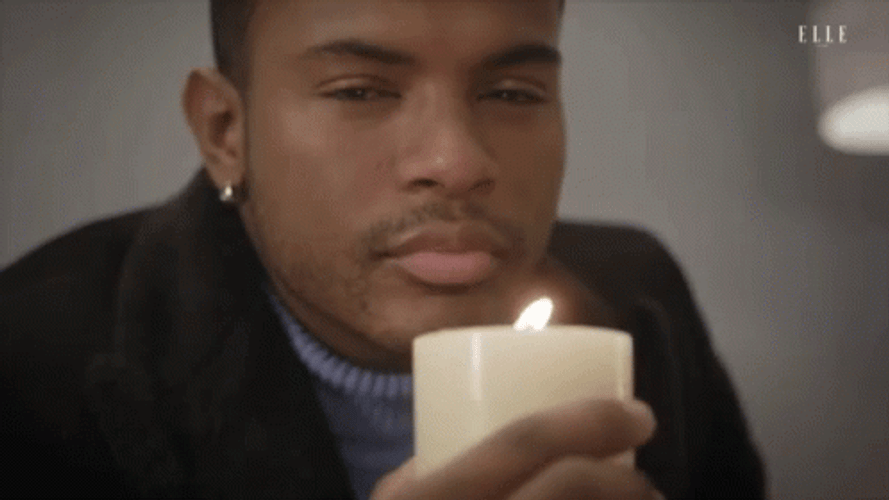 Man Blows The Bougie GIF