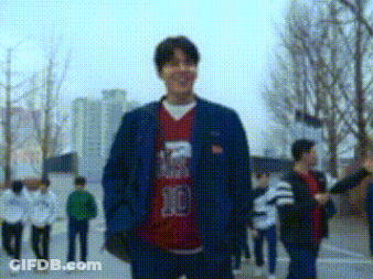 Man Blue Jacket Red Shirt Number 10 Walking GIF