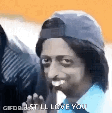 Man Blue Shirt Hat Eating Banana Says I Still Love You GIF