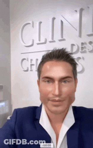 Man Blue Suit Clin Des Choses Sign GIF