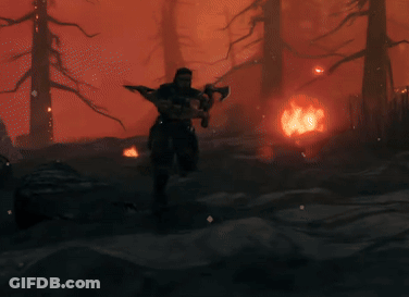 Man By Fire In Forest GIF