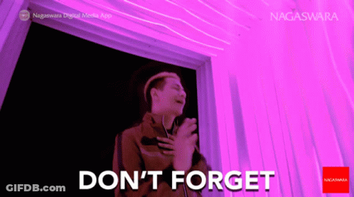 Man By Purple Wall Saying Don't Forget GIF