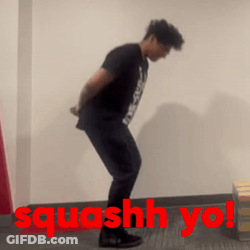 Man By Wall With Red Squash Yo GIF