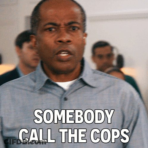 Man Calling Cops In Crowd GIF