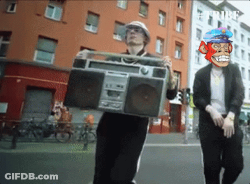 Man Carrying Boombox With Monkey Face On Head GIF