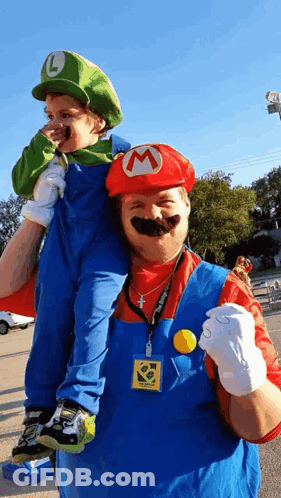 Man Carrying Boy On Shoulders As Mario And Luigi GIF