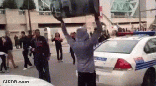 Man Carrying Car Over Head GIF