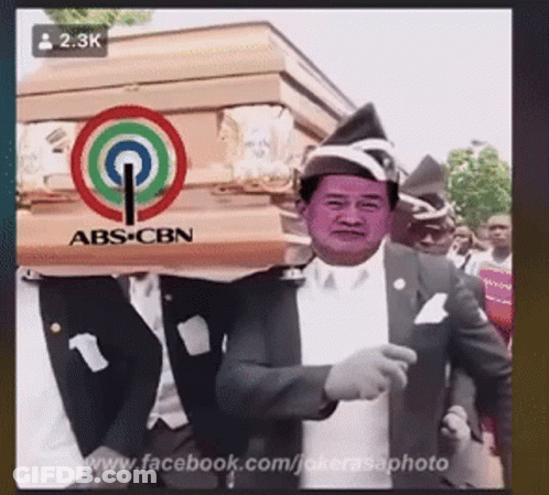 Man Carrying Coffin With ABS-CBN GIF
