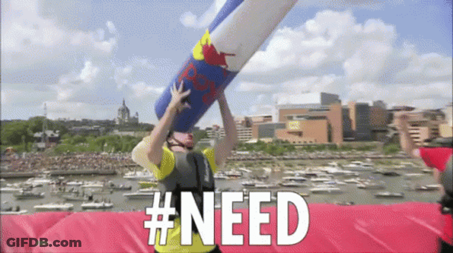 Man Carrying Giant Red Bull Can GIF
