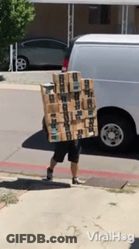 Man Carrying Stack Of Amazon Boxes On Back GIF