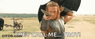 Man Carrying Sword Saying They Call Me Troy GIF