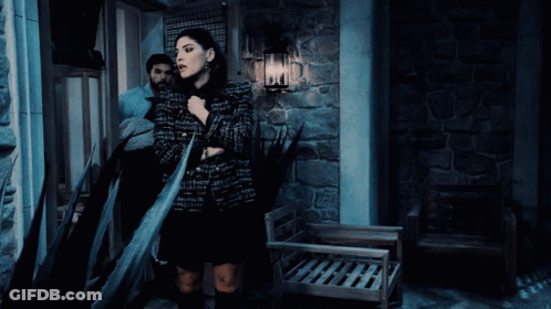 Man Carrying Woman In Arms GIF