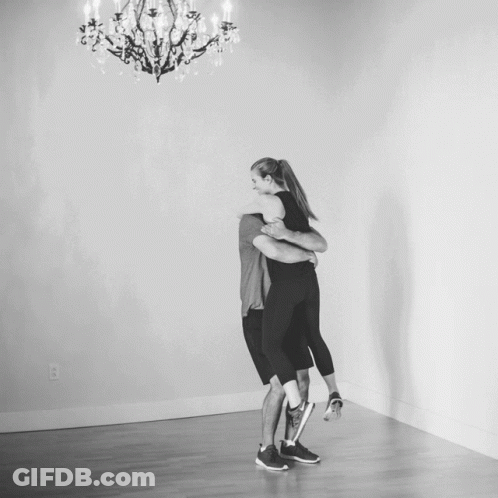 Man Carrying Woman In Arms GIF