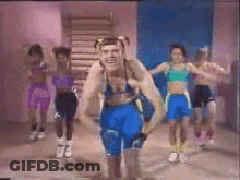 Man Carrying Woman On Shoulders GIF