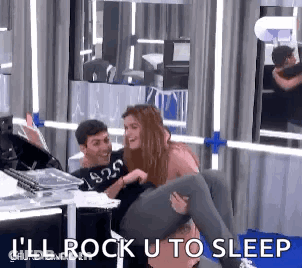 Man Carrying Woman On Shoulders While Woman Laughs GIF