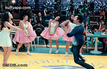 Man Carrying Women On Shoulders Dancing GIF