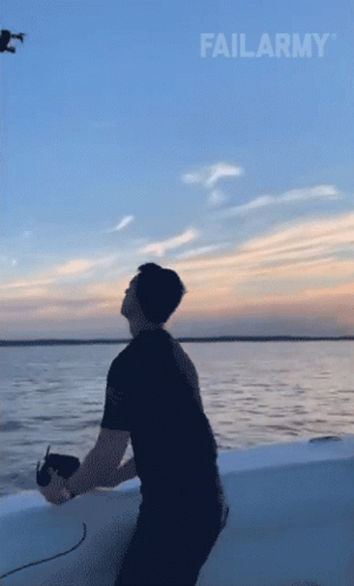 Man Catching The Drone GIF