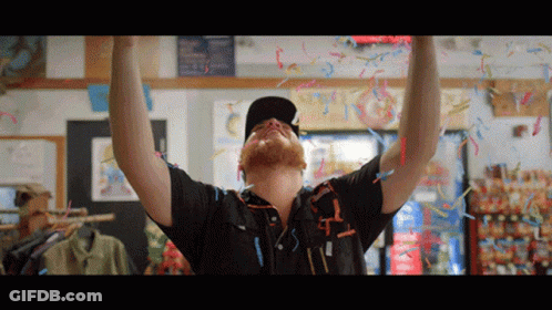 Man Celebrating With Confetti And Streamers GIF