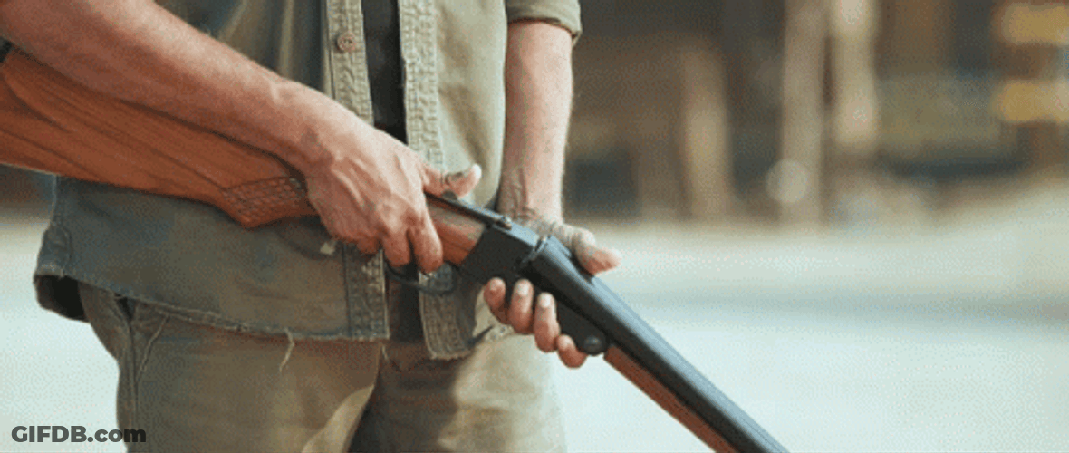 Man Checking His Shotgun GIF