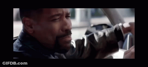 Man Checking Watch In Driver's Seat GIF