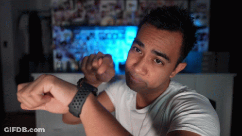 Man Checking Watch Making A Face GIF