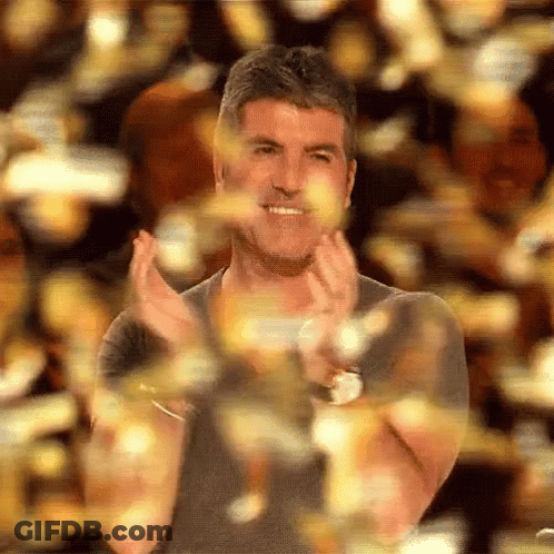 Man Clapping Hands In Front Of Crowd GIF