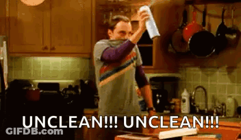 Man Cleaning Kitchen Counter Says Unclean Unclean GIF