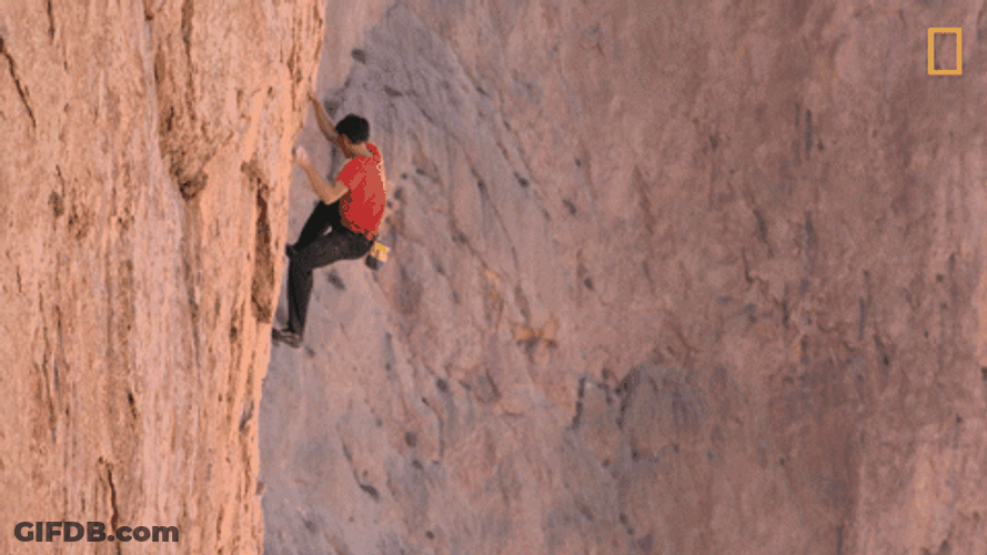 Man Climbing Mountain Alone GIF