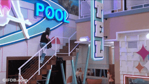 Man Climbing Stairs Near Pool Sign GIF