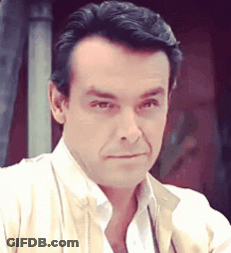 Man Close Up Wearing White Shirt And Tan Jacket GIF
