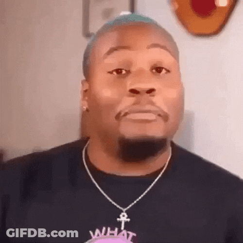 Man Closes Mouth Holding In Laugh GIF