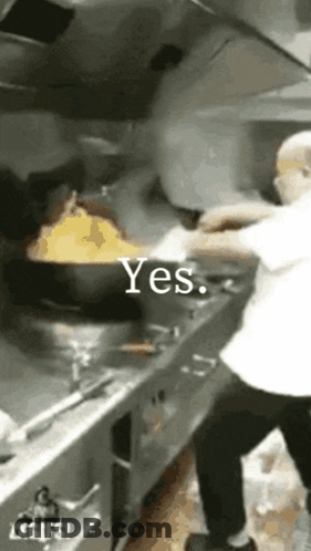 Man Cooking In Kitchen Saying Yes GIF