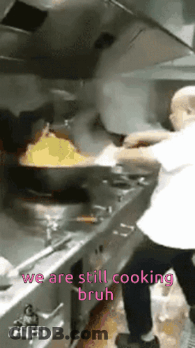 Man Cooking In Kitchen We Are Still Cooking Bruh GIF