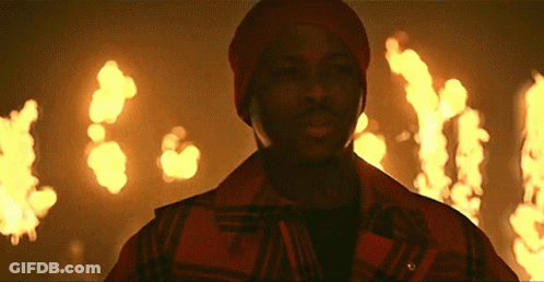 Man Cooking On Stove Talking On Phone GIF