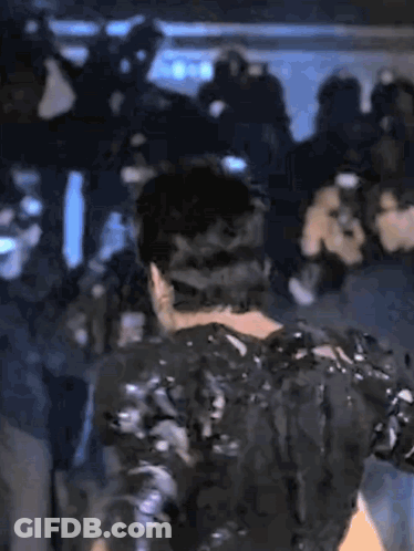 Man Covered In Black Wax GIF