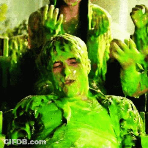 Man Covered In Green Slime With Woman GIF