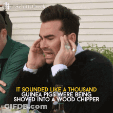 Man Covering Ears Saying Guinea Pigs GIF